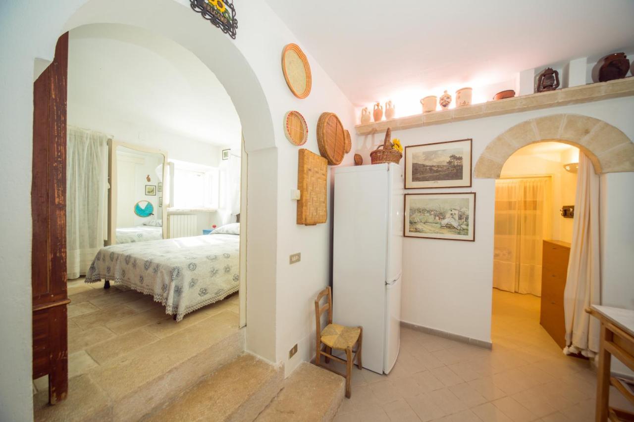 Trulli Girasoli E Viole Cocolicchio Bilik gambar