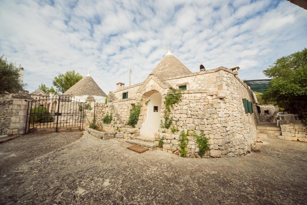 Trulli Girasoli E Viole Cocolicchio Luaran gambar
