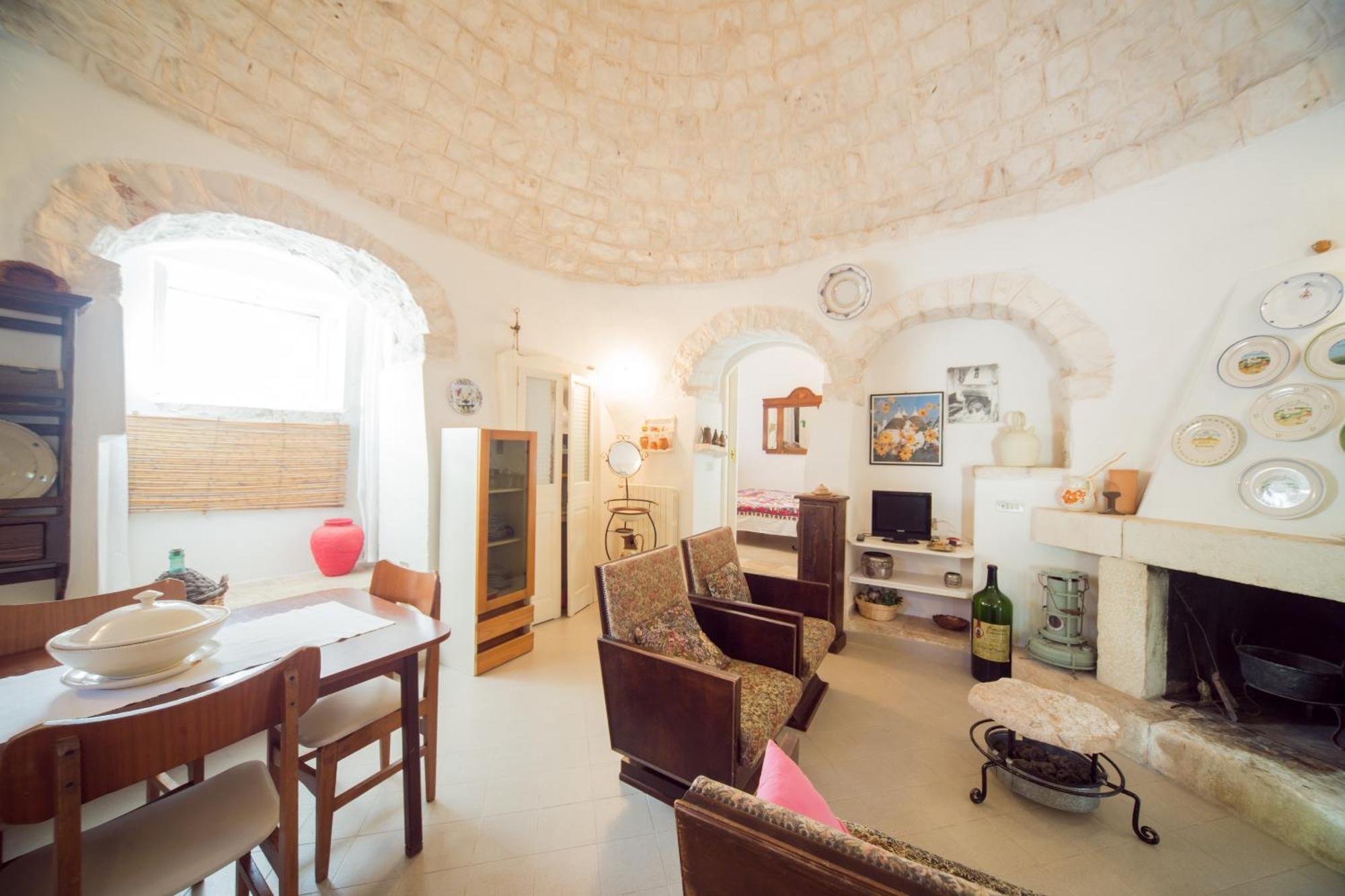Trulli Girasoli E Viole Cocolicchio Bilik gambar